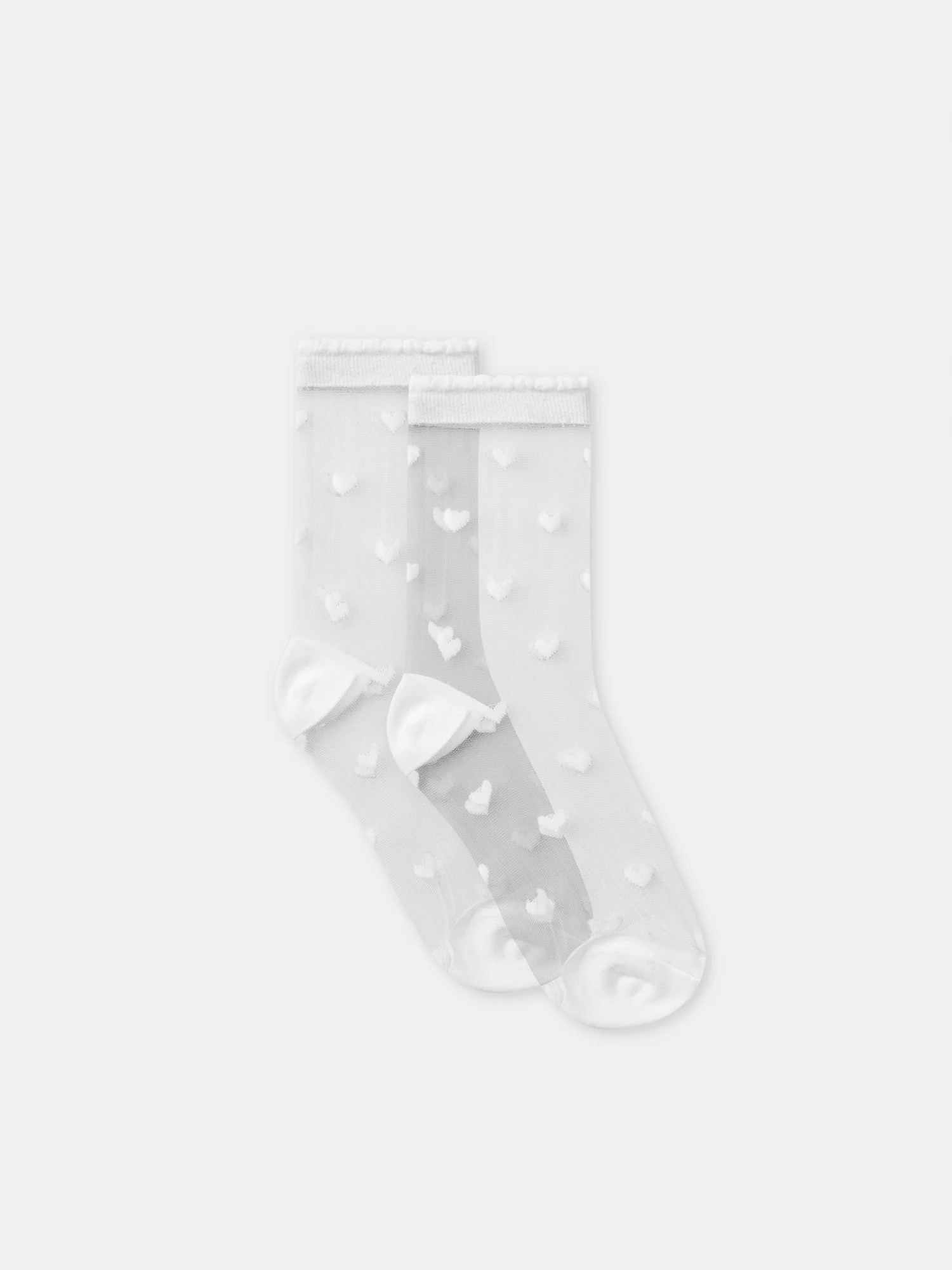 Chaussettes transparentes motif coeurs Fille
